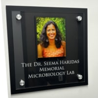 Plaque outside The Dr. Seema Haridas Memorial Microbiology Lab