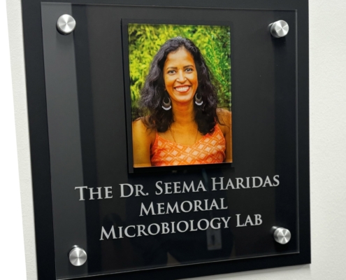 Plaque outside The Dr. Seema Haridas Memorial Microbiology Lab